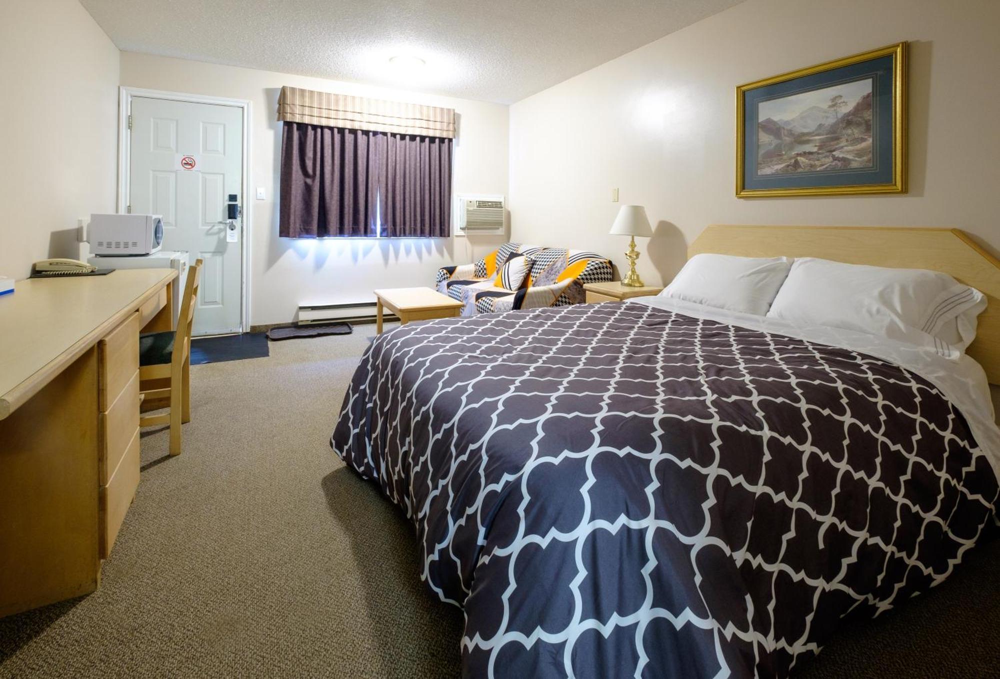 Perfect Inns & Suites Weyburn Rom bilde