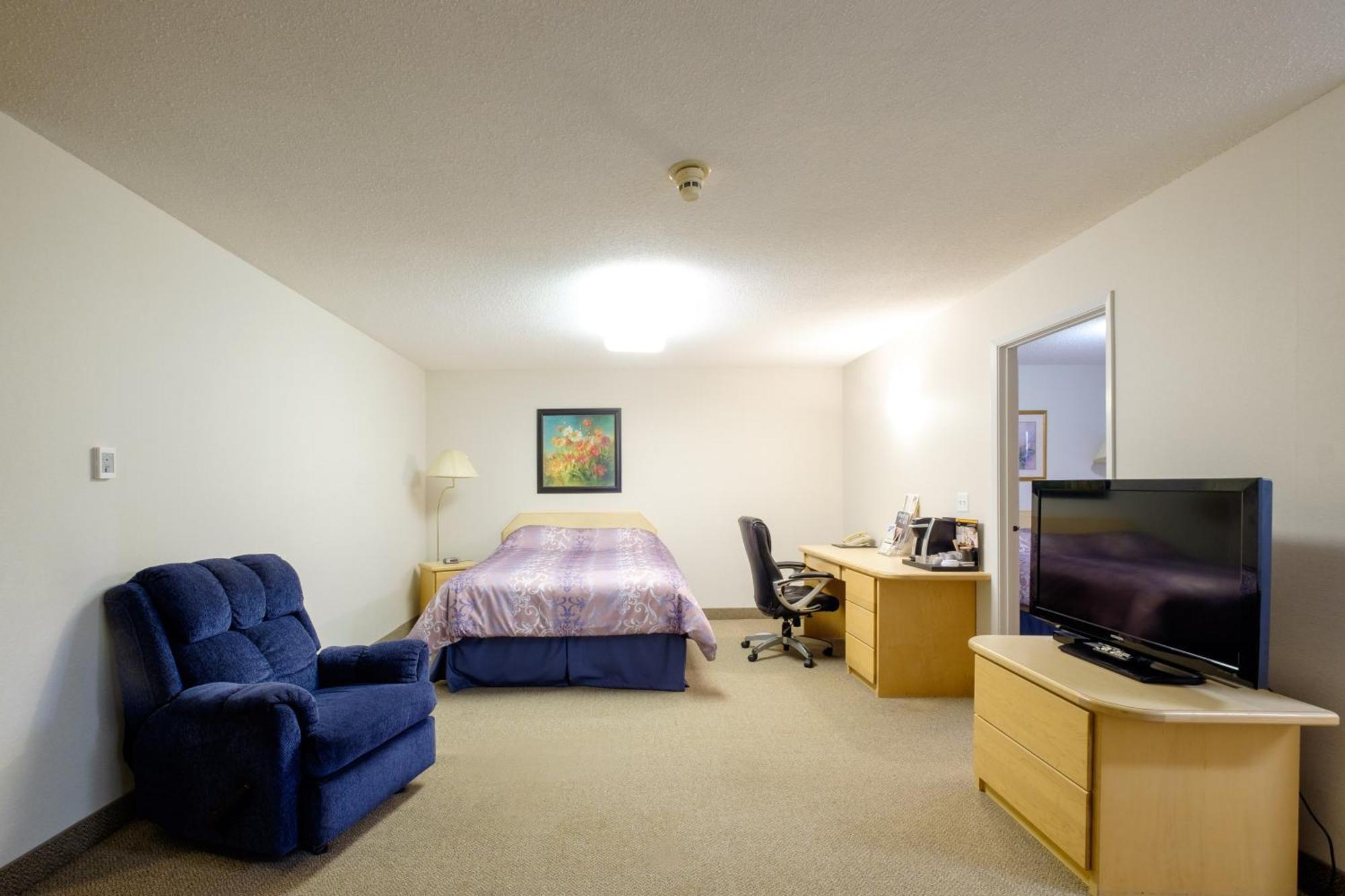 Perfect Inns & Suites Weyburn Rom bilde